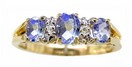 LDS 3 OVAL TANZANITE RG W/2 DIAS